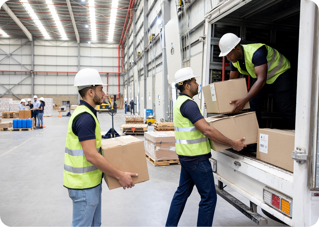 Warehouse staff handling packages