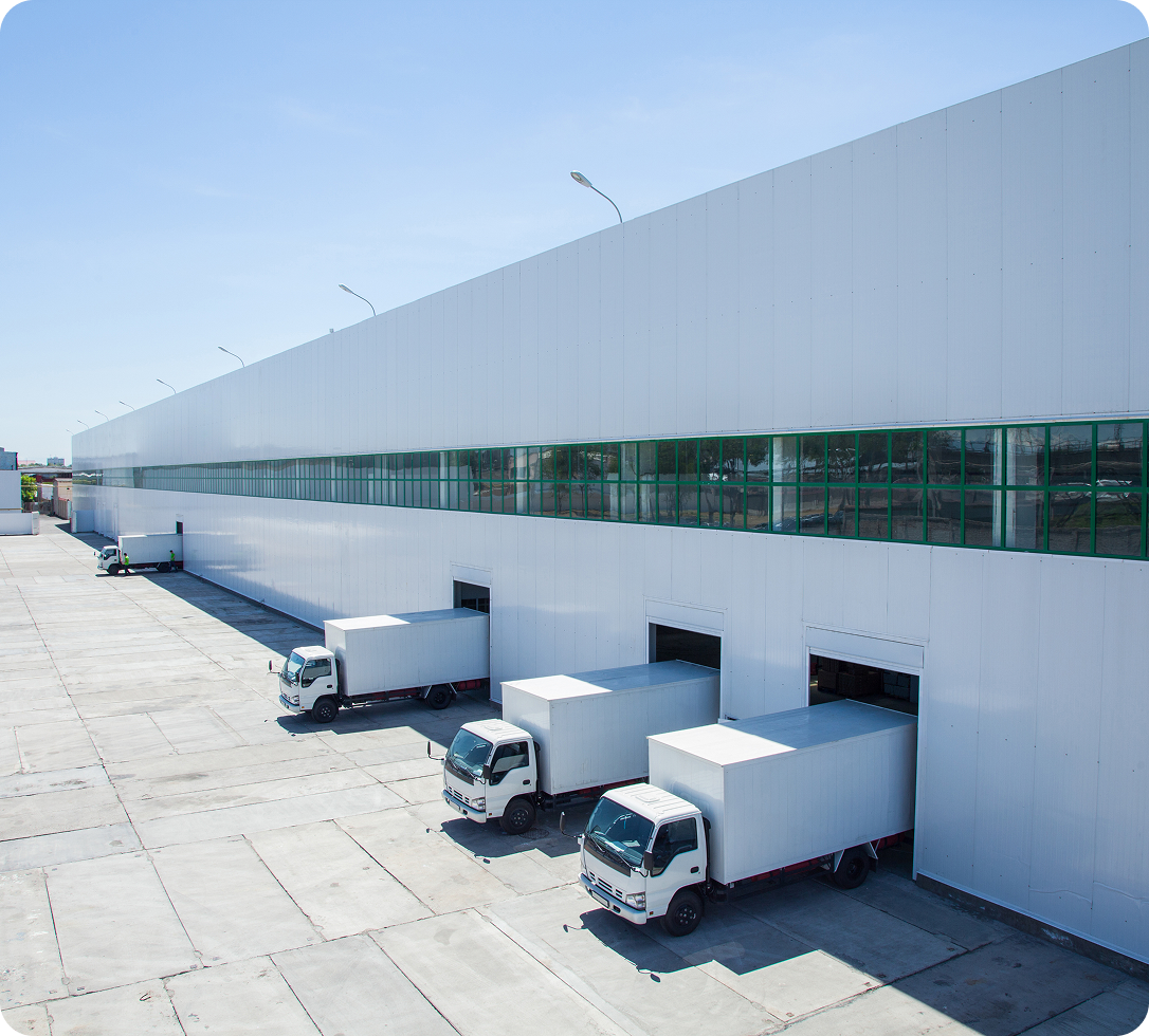 Warehouse loading dock with trucks